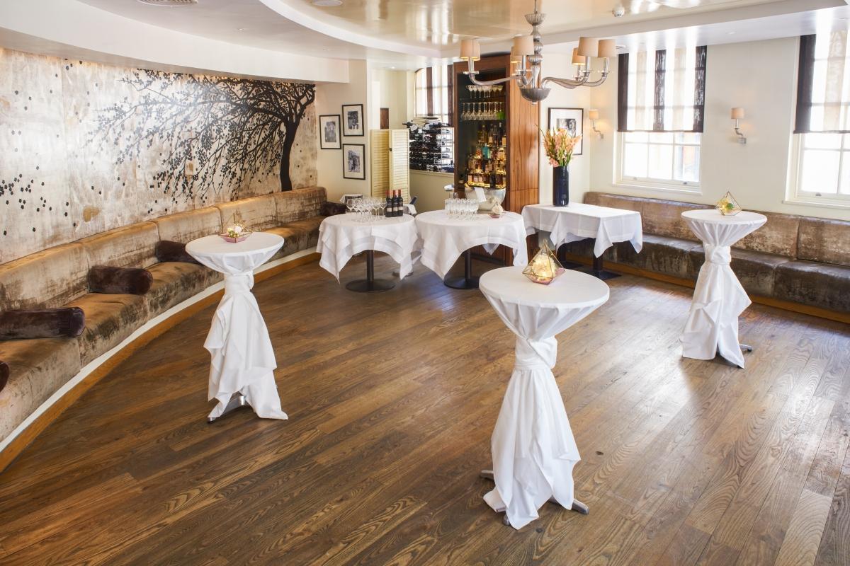 Elegant Blades Room at Hush Mayfair, perfect for cocktail receptions and networking events.