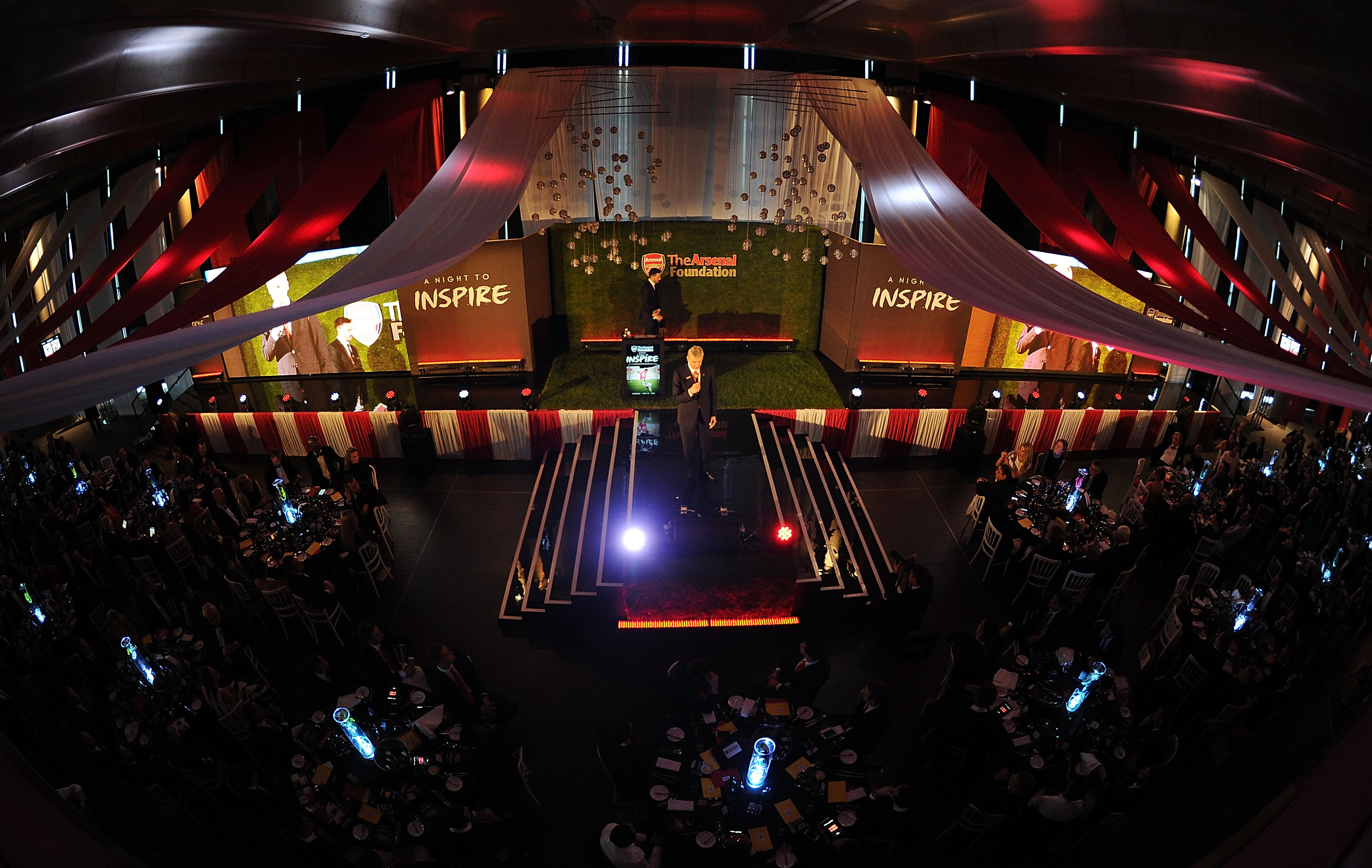 Emirates Stadium event space with vibrant lighting for networking and engagement.