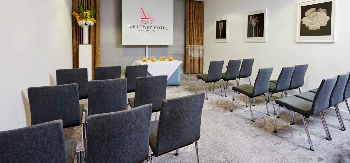 Modern meeting room at The Lowry Hotel, perfect for workshops and conferences.