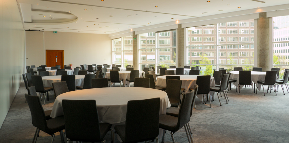 Half Ball Room at The Lowry Hotel, spacious venue with natural light for events and meetings.