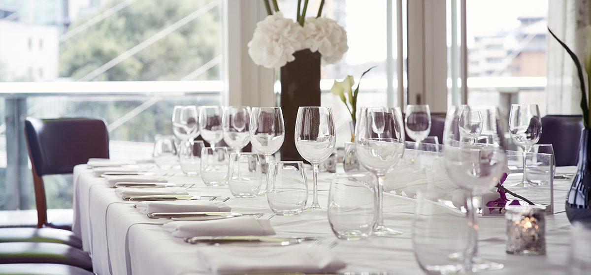 Private dining room at The Lowry Hotel with elegant table setting for corporate events.