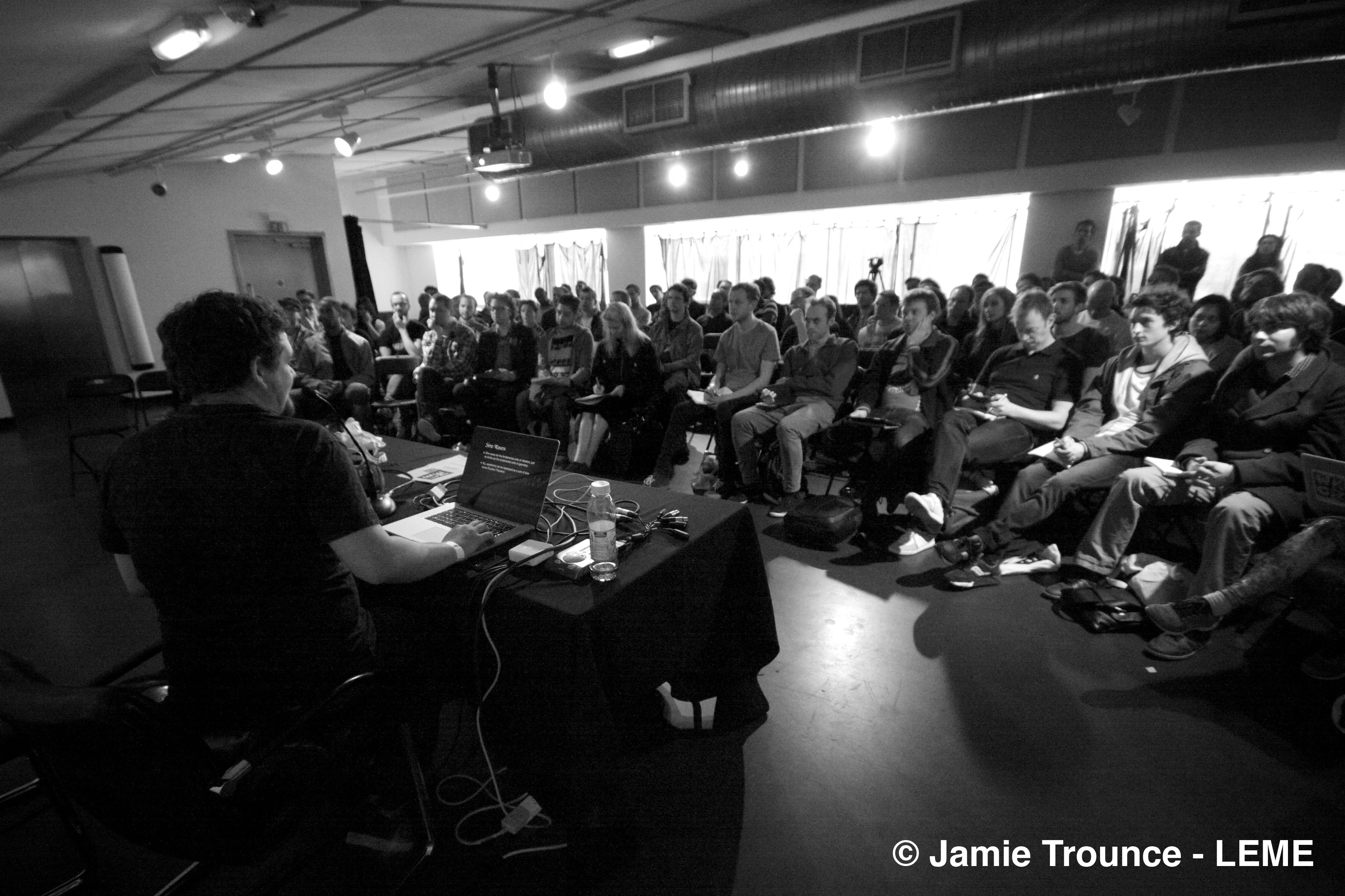 Engaged audience at a professional seminar in The Mix, Rich Mix, with technology presentations.