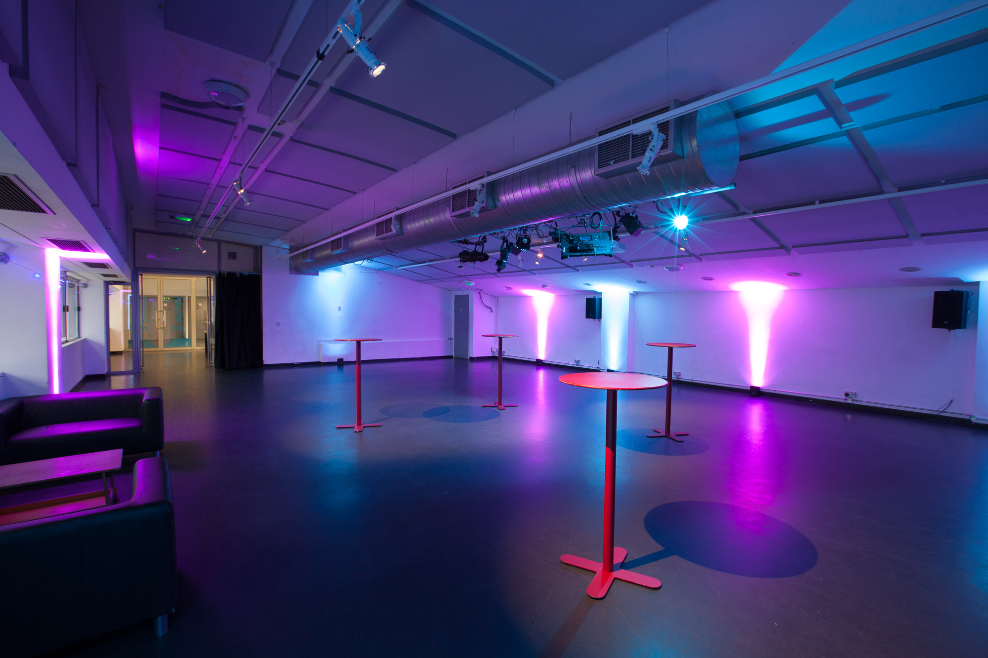 Versatile event space at The Mix, featuring modern lighting for networking and receptions.