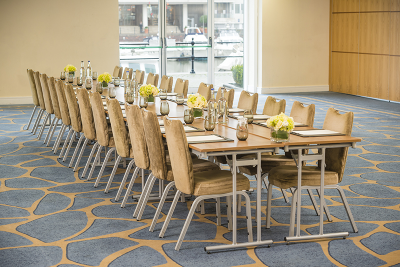 Grand Room 1 at Chelsea Harbour Hotel, modern meeting setup with natural light.