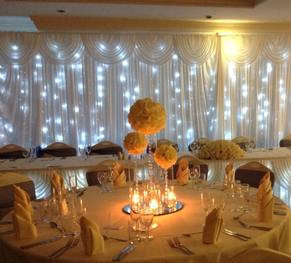 Elegant event space at The Yacht Club with floral centerpieces for weddings and corporate events.