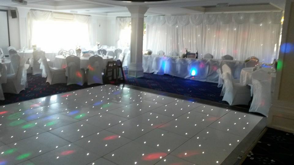 Elegant event space in The Yacht Club with dance floor, ideal for weddings and upscale gatherings.