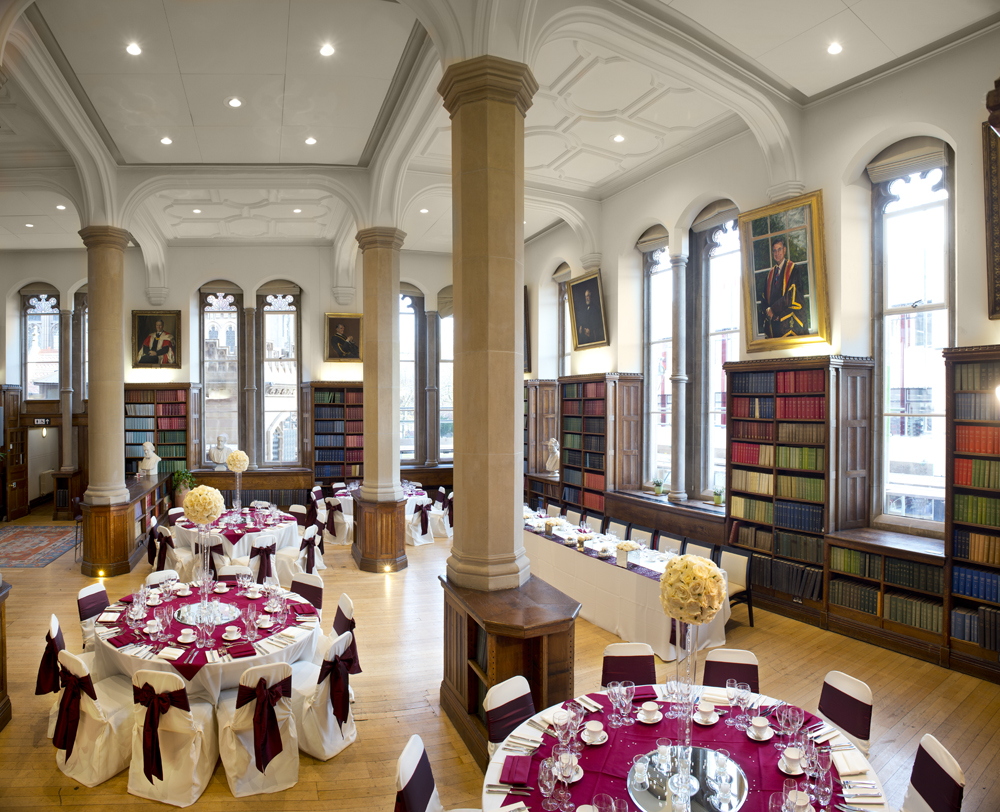 Elegant event space at Christie's Bistro with round tables for upscale receptions.