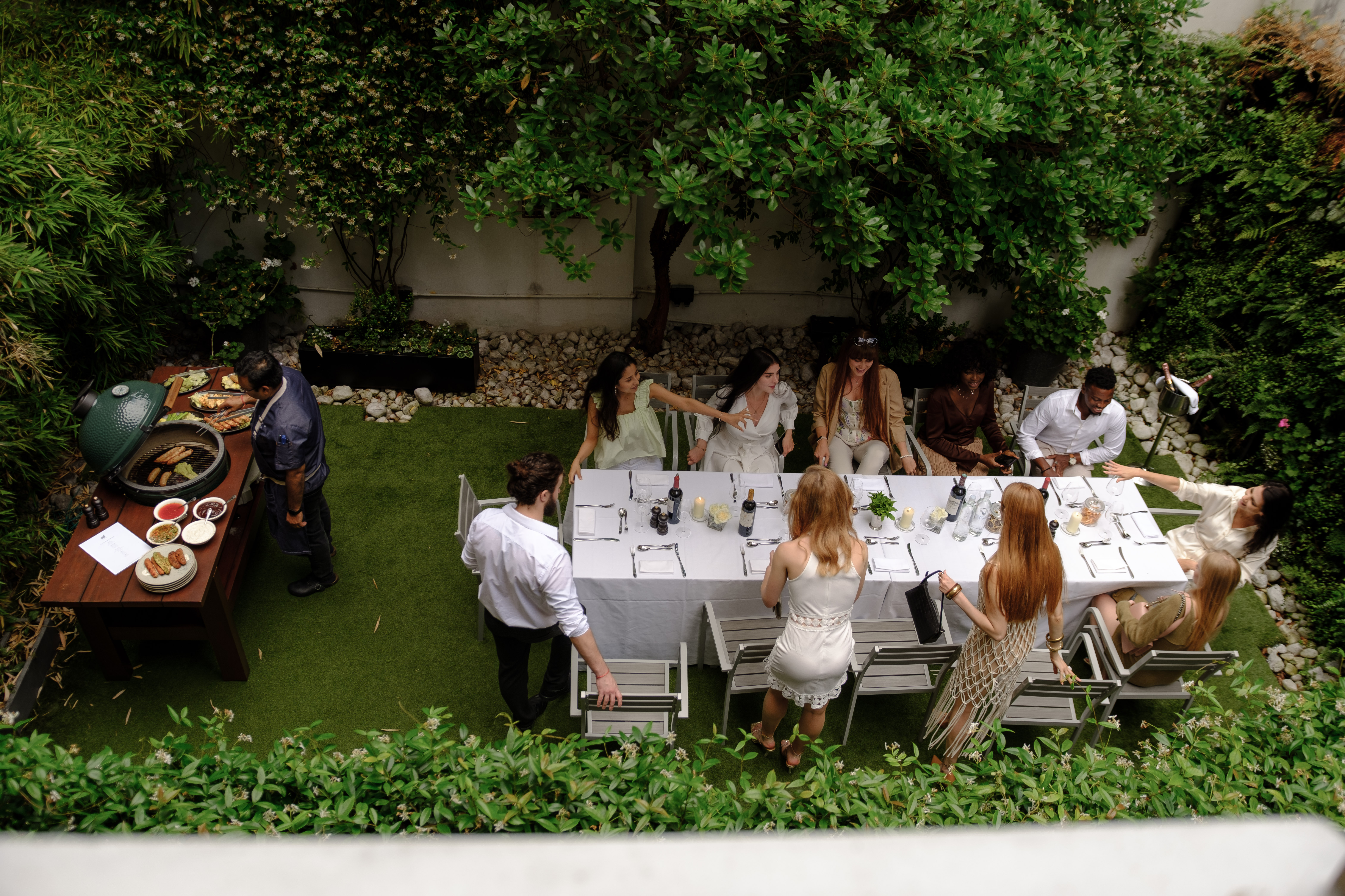 Hyde Garden at Roseate House London, lush greenery for corporate retreats and social events.