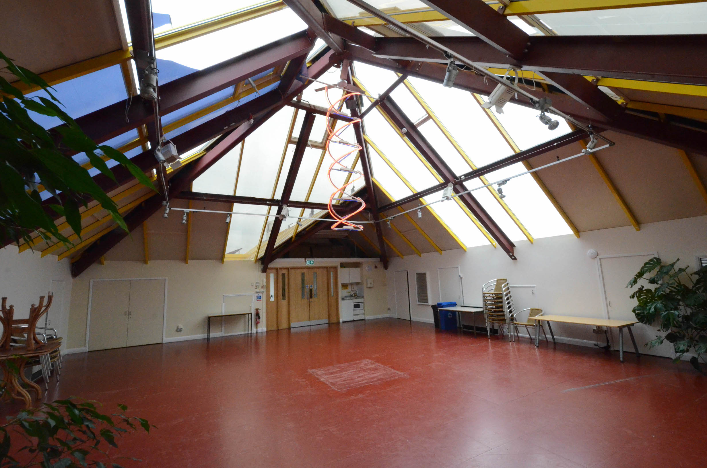 Spacious Pyramid Room in Paddington Arts, ideal for workshops and meetings with natural light.