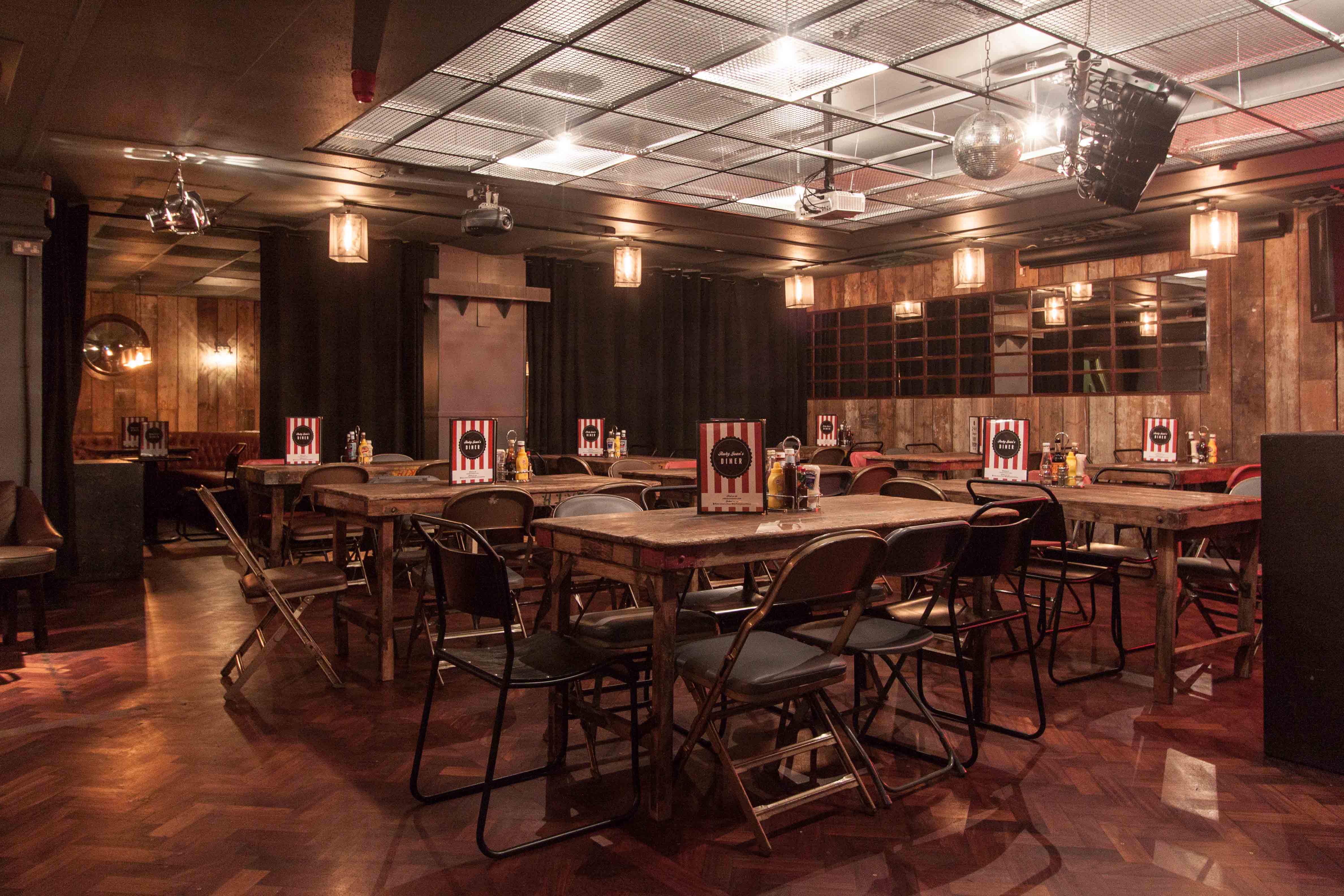Intimate event space with rustic decor for networking and meetings in The Phoenix, Cavendish Square.
