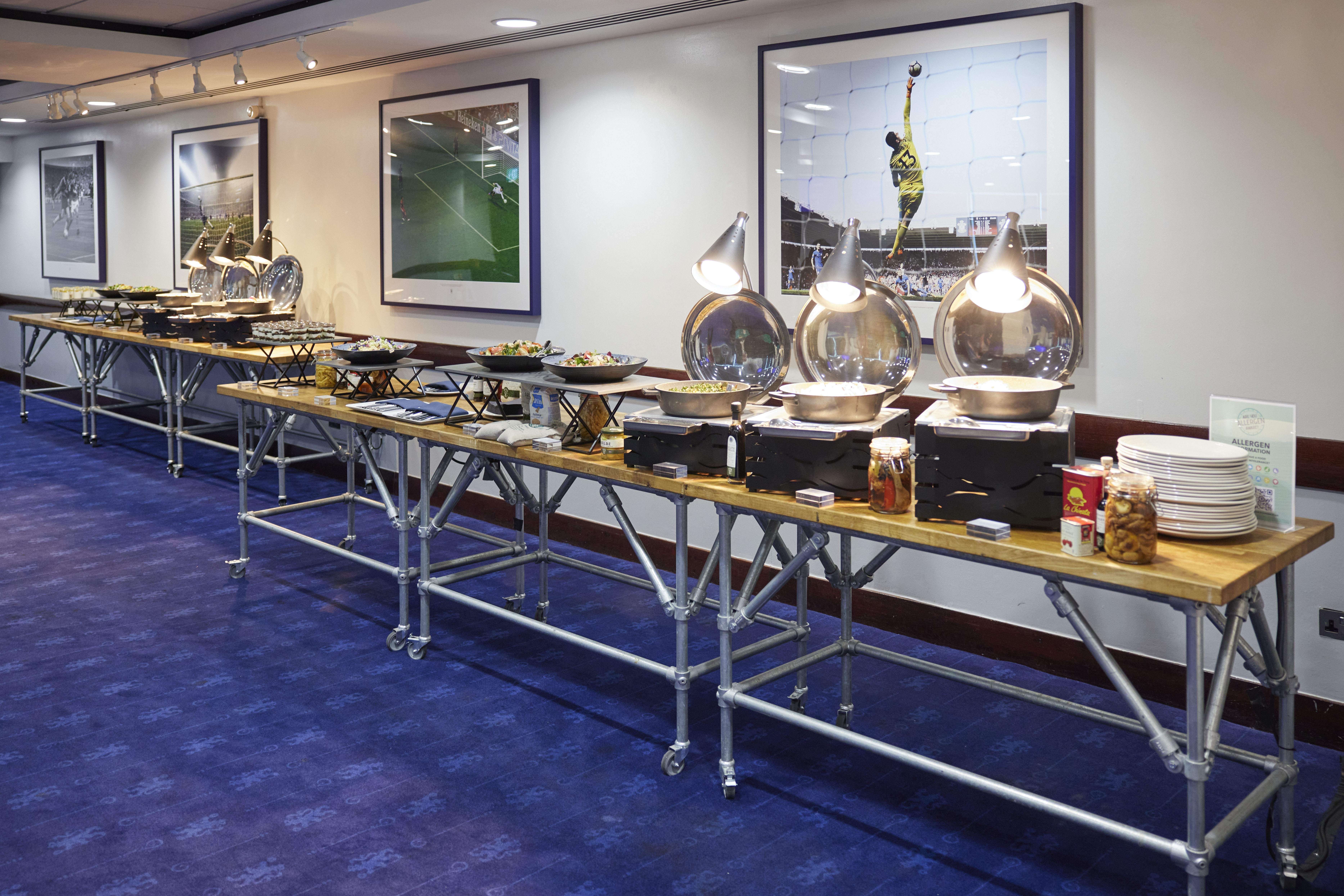 Buffet setup in Chelsea FC's Tambling and Hollins Suites for corporate events.
