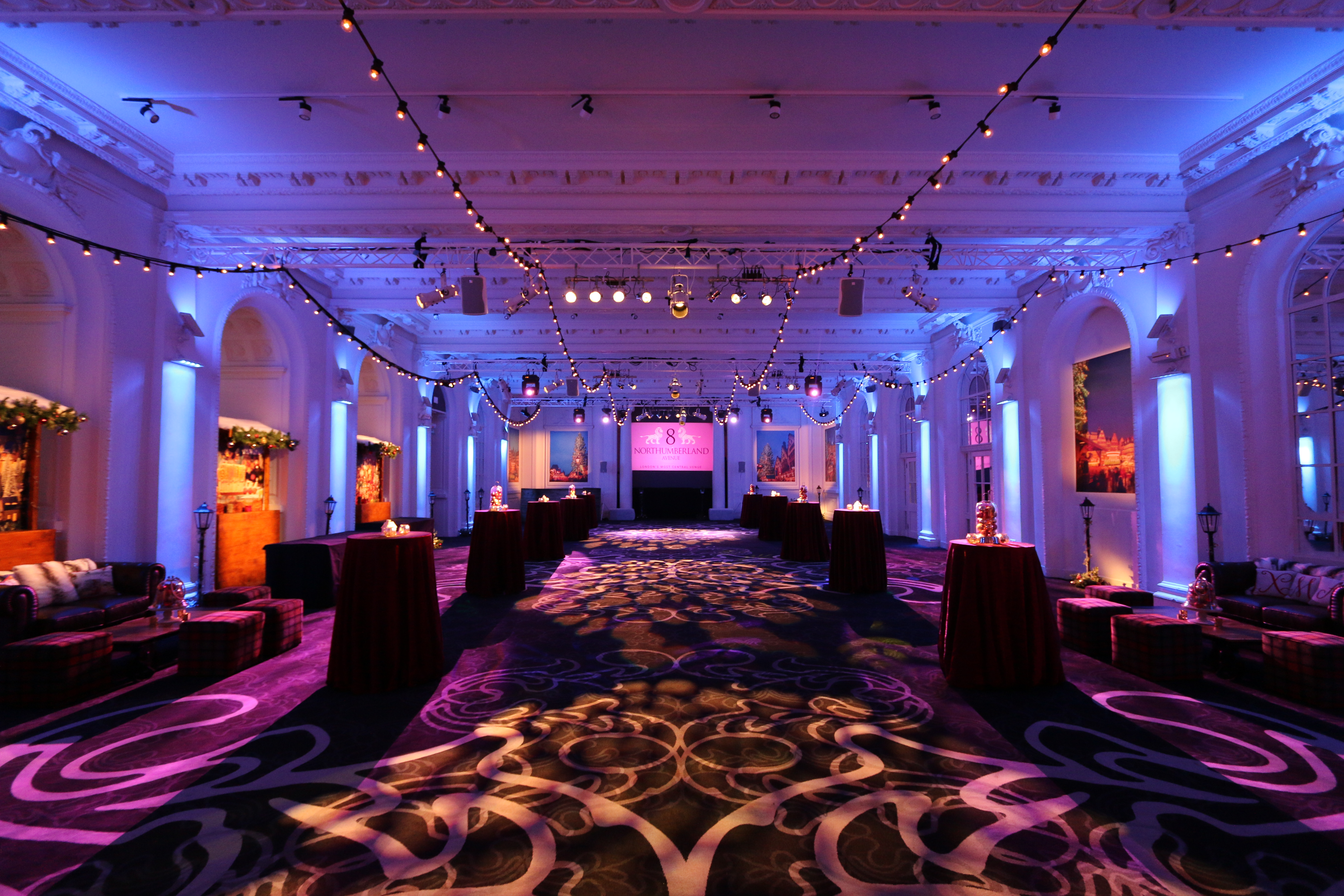Old Billiard Room event space with elegant lighting for upscale networking gatherings.