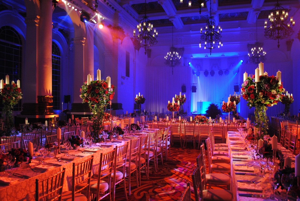 Elegant ballroom with floral centerpieces, ideal for gala events and formal dinners.