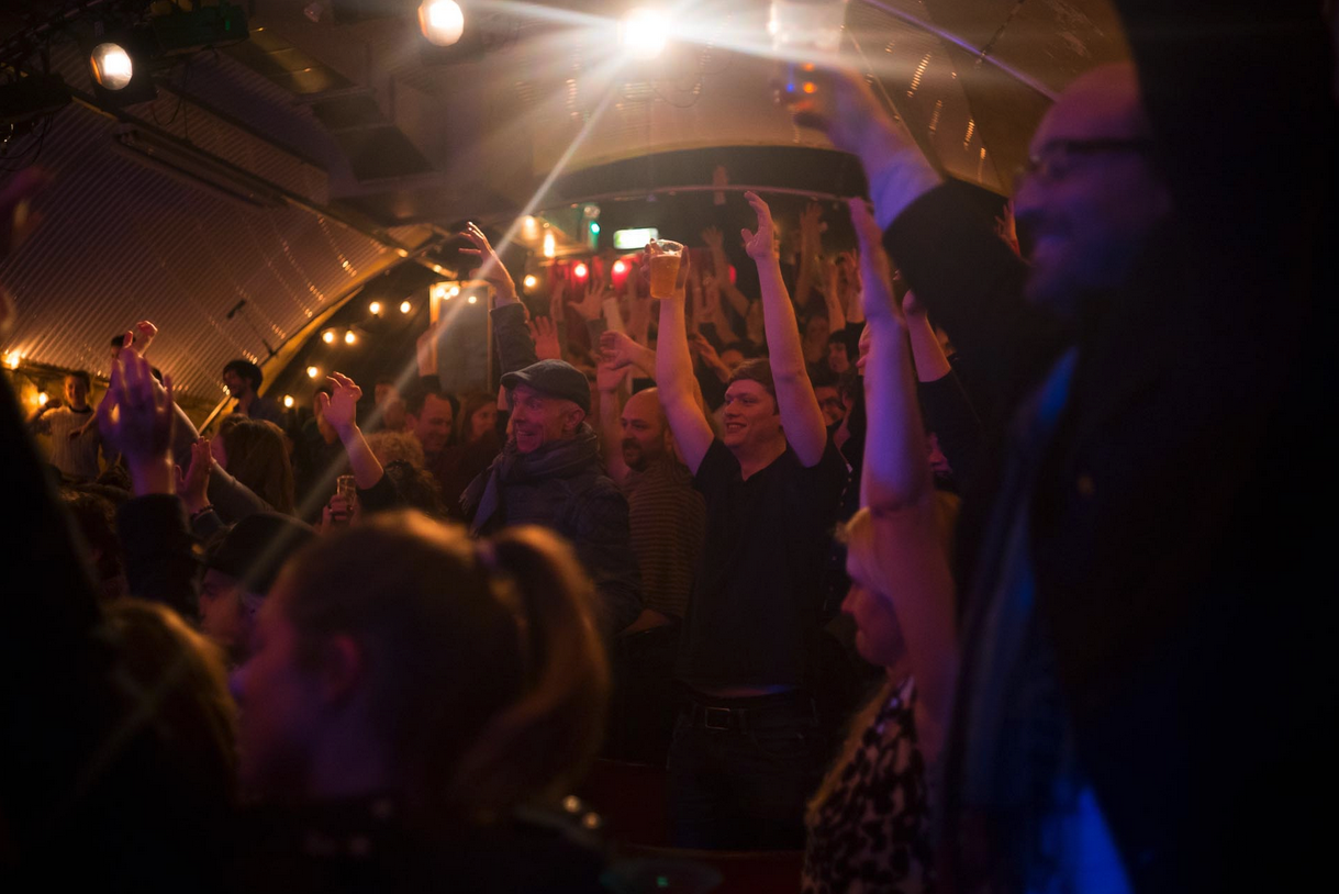 Vibrant crowd at The Vaults Theatre, perfect for networking and entertainment events.