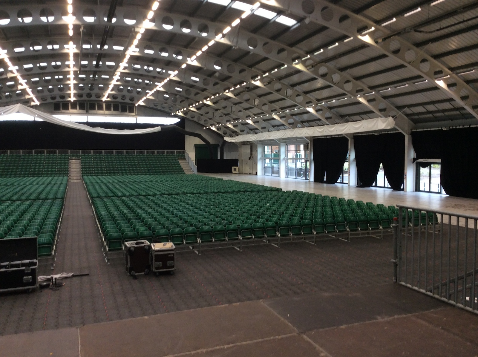 Aintree Equestrian Centre with green chairs, ideal for conferences and events.