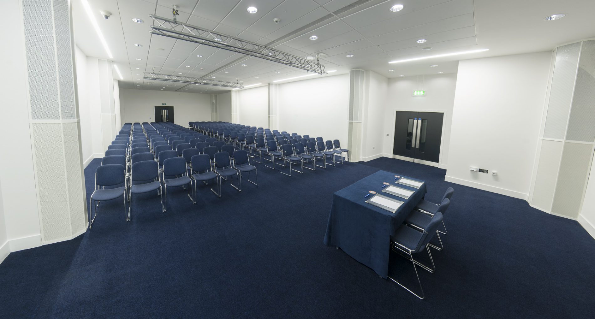 Spacious meeting room in Manchester Central for conferences with modern design and seating.