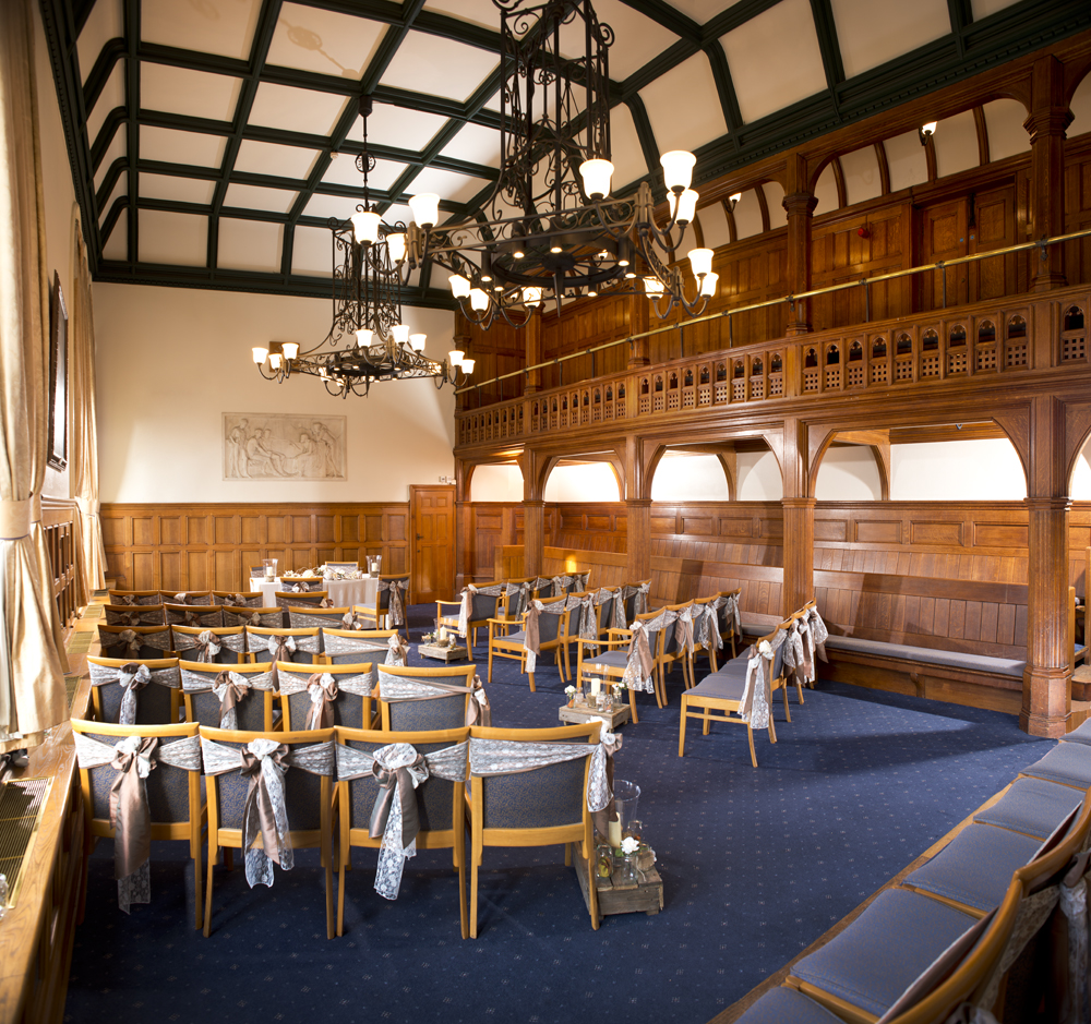 Whitworth Building Council Chamber with elegant wood paneling, perfect for events.