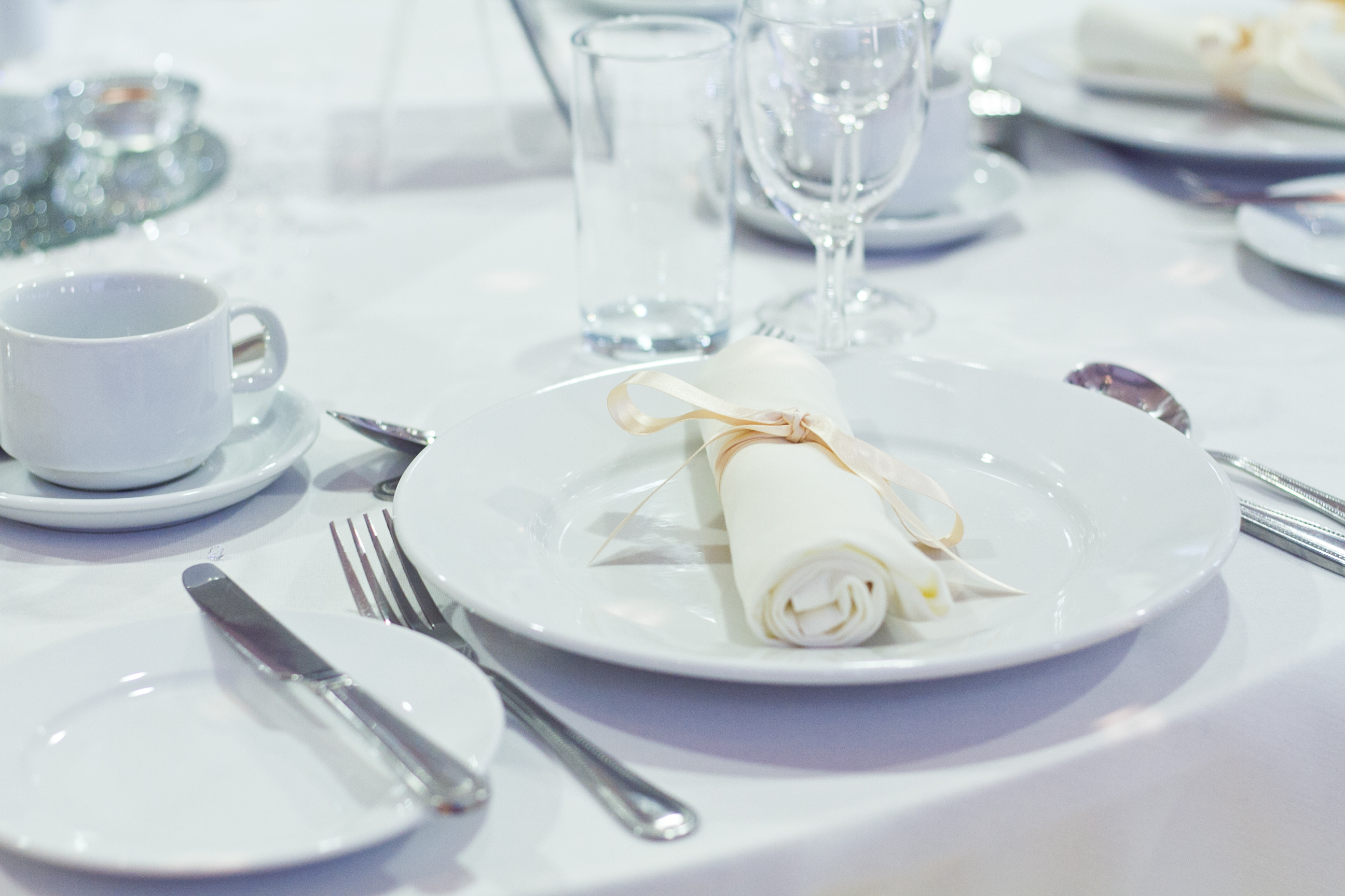 Elegant dining table setup in McNamara Suite for corporate events and celebrations.