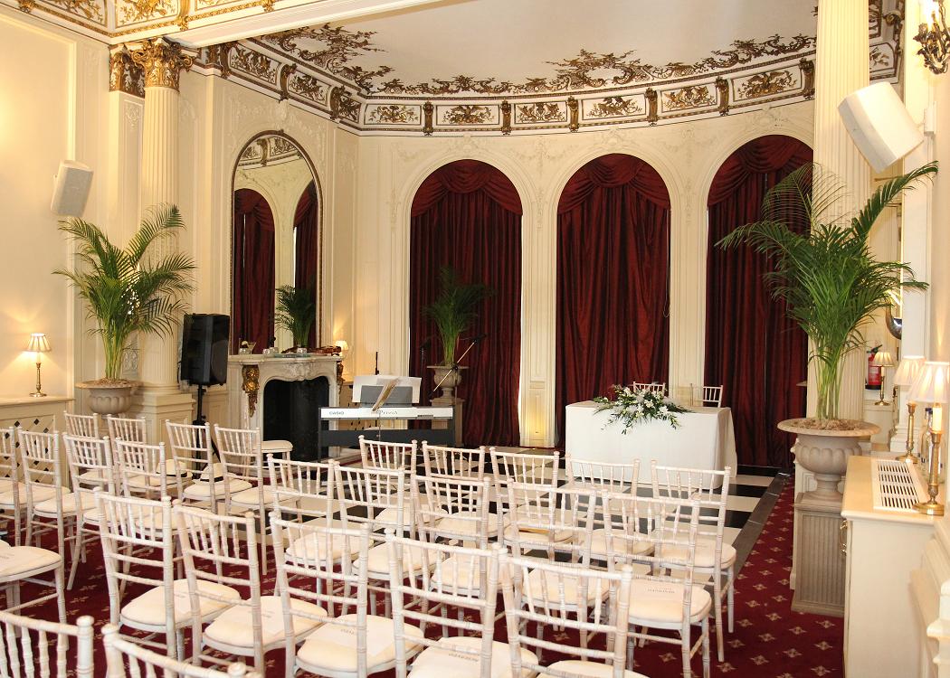 Elegant Argyll Room with red drapes, ideal for weddings and corporate events.