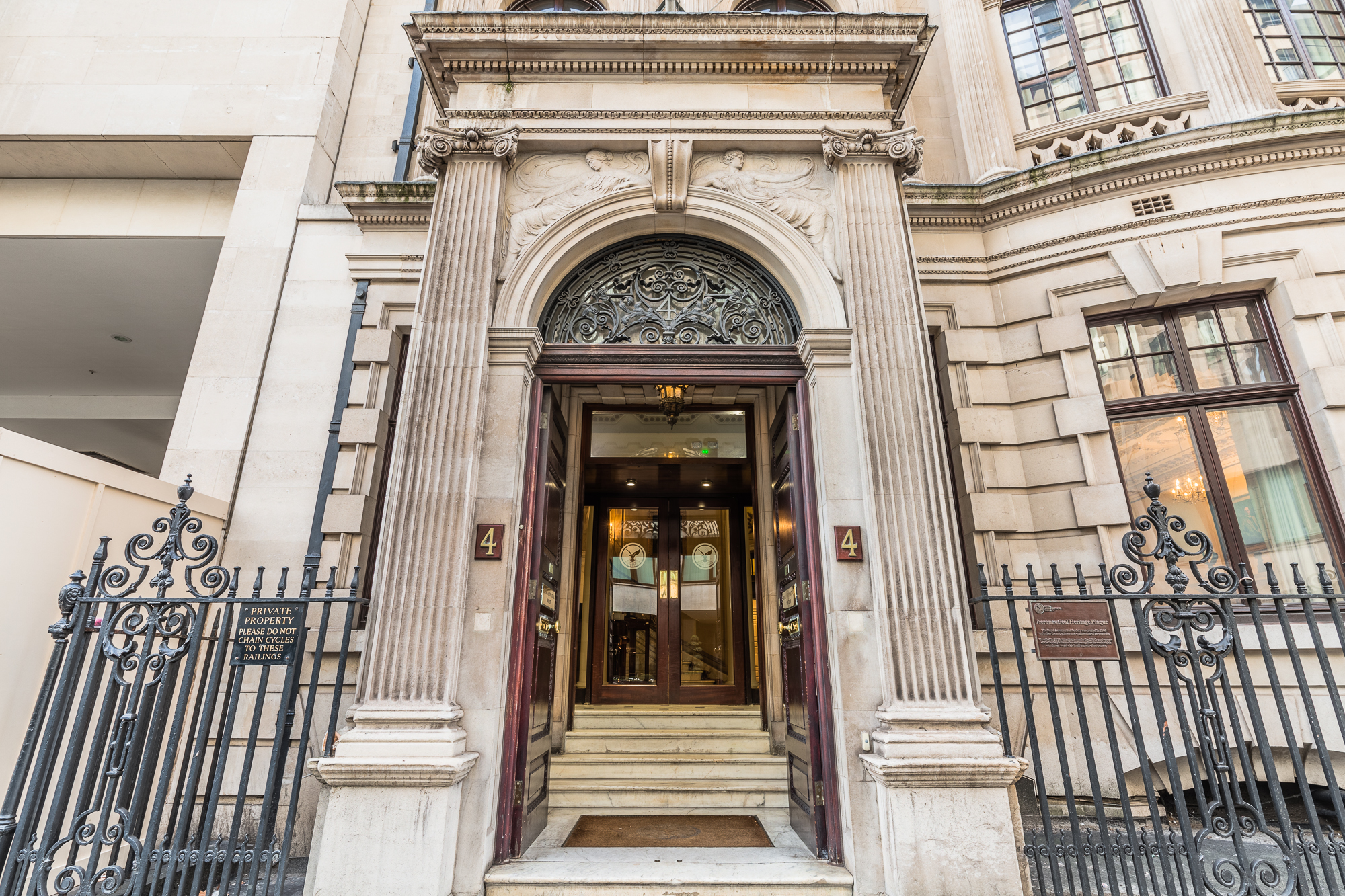 Elegant entrance of Marshall of Cambridge, ideal for corporate events and upscale gatherings.