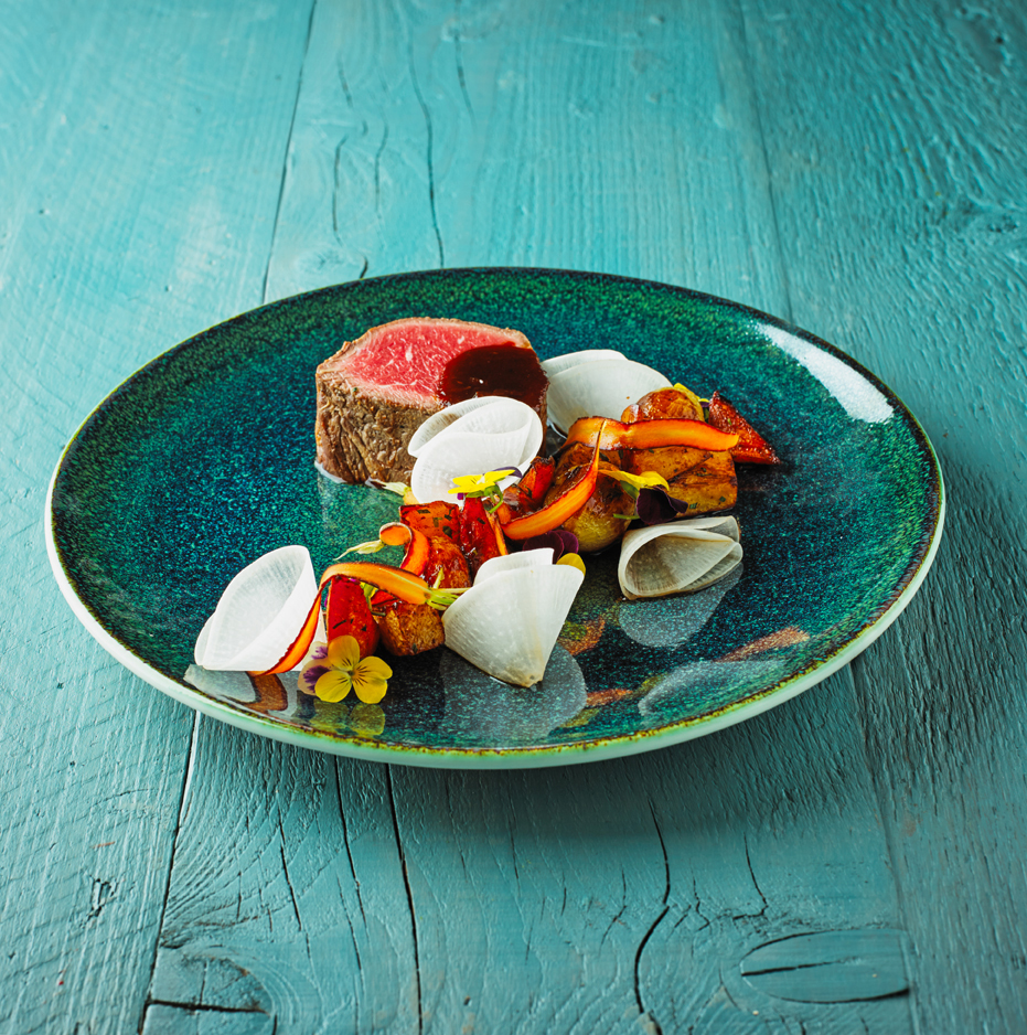 Plated beef dish with grilled vegetables for upscale events at Marshall of Cambridge.