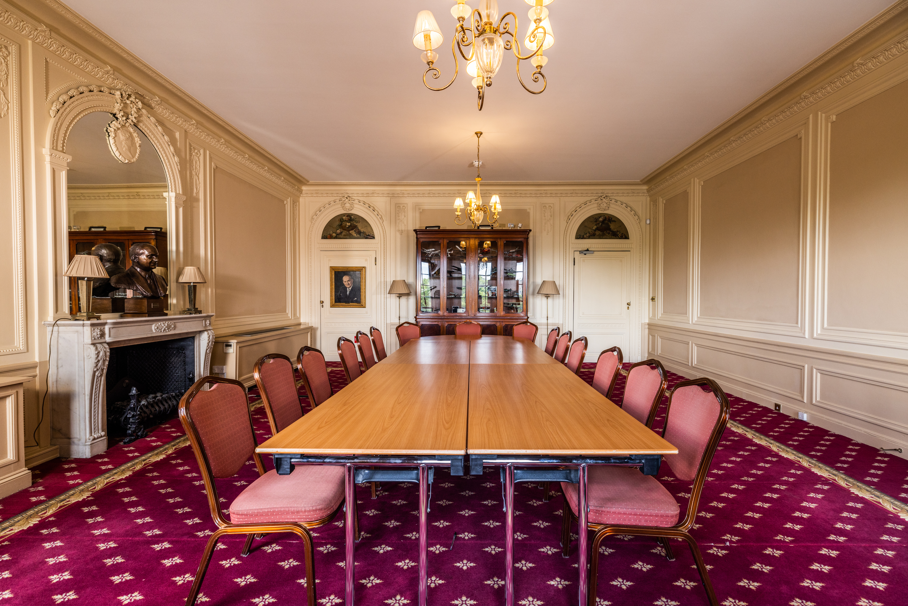 Elegant Handley Page Room with long table, ideal for corporate events and meetings.