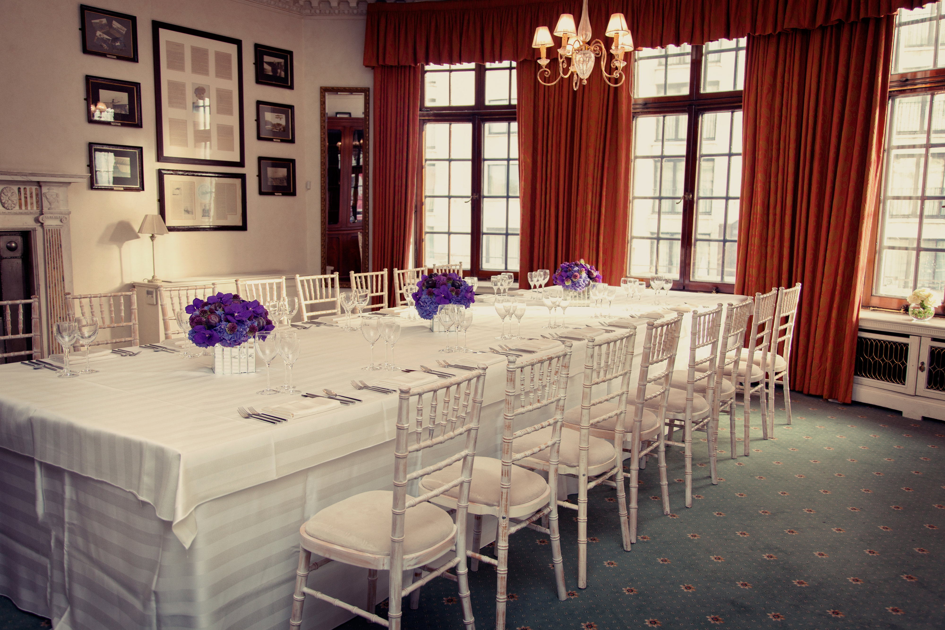 Elegant Handley Page Room with long table, ideal for corporate events and meetings.