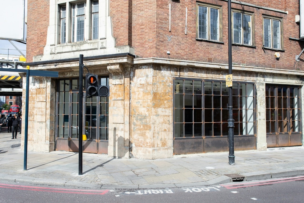 Versatile Kachette Shoreditch venue with large windows, ideal for corporate events and meetings.
