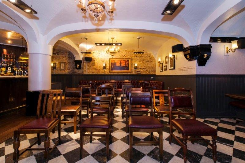 Marthas Cellar Bar: rustic event space with warm lighting for networking and workshops.