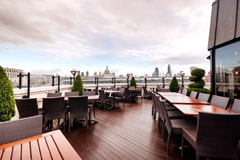 Stylish outdoor terrace at Doggett's Coat and Badge, ideal for networking events and receptions.