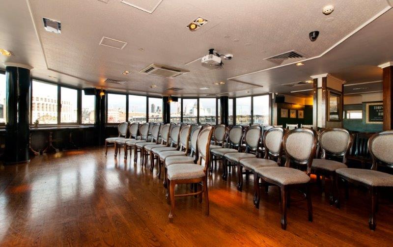 Elegant meeting space in The Boardroom, Doggett's Coat and Badge, perfect for workshops.