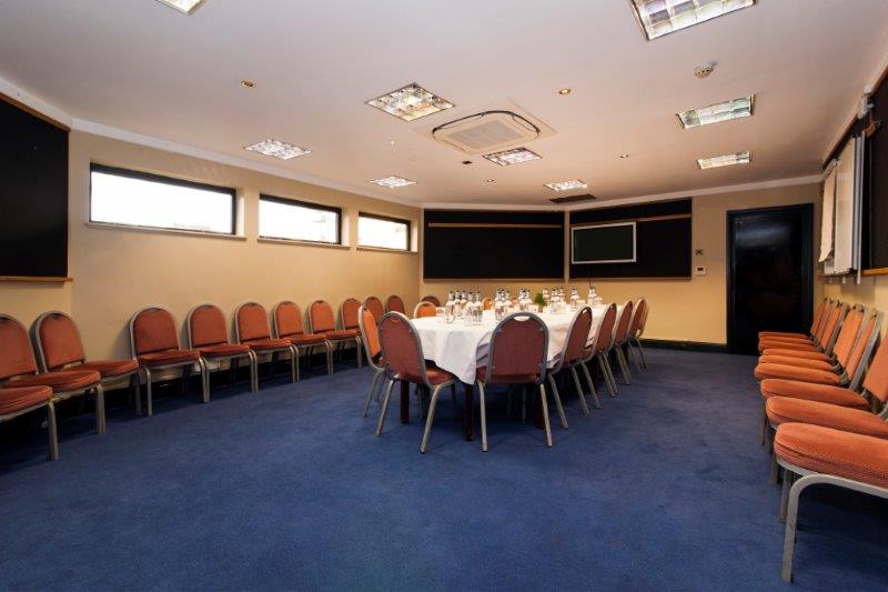 Boardroom at Doggett's Coat and Badge, ideal for corporate meetings and presentations.