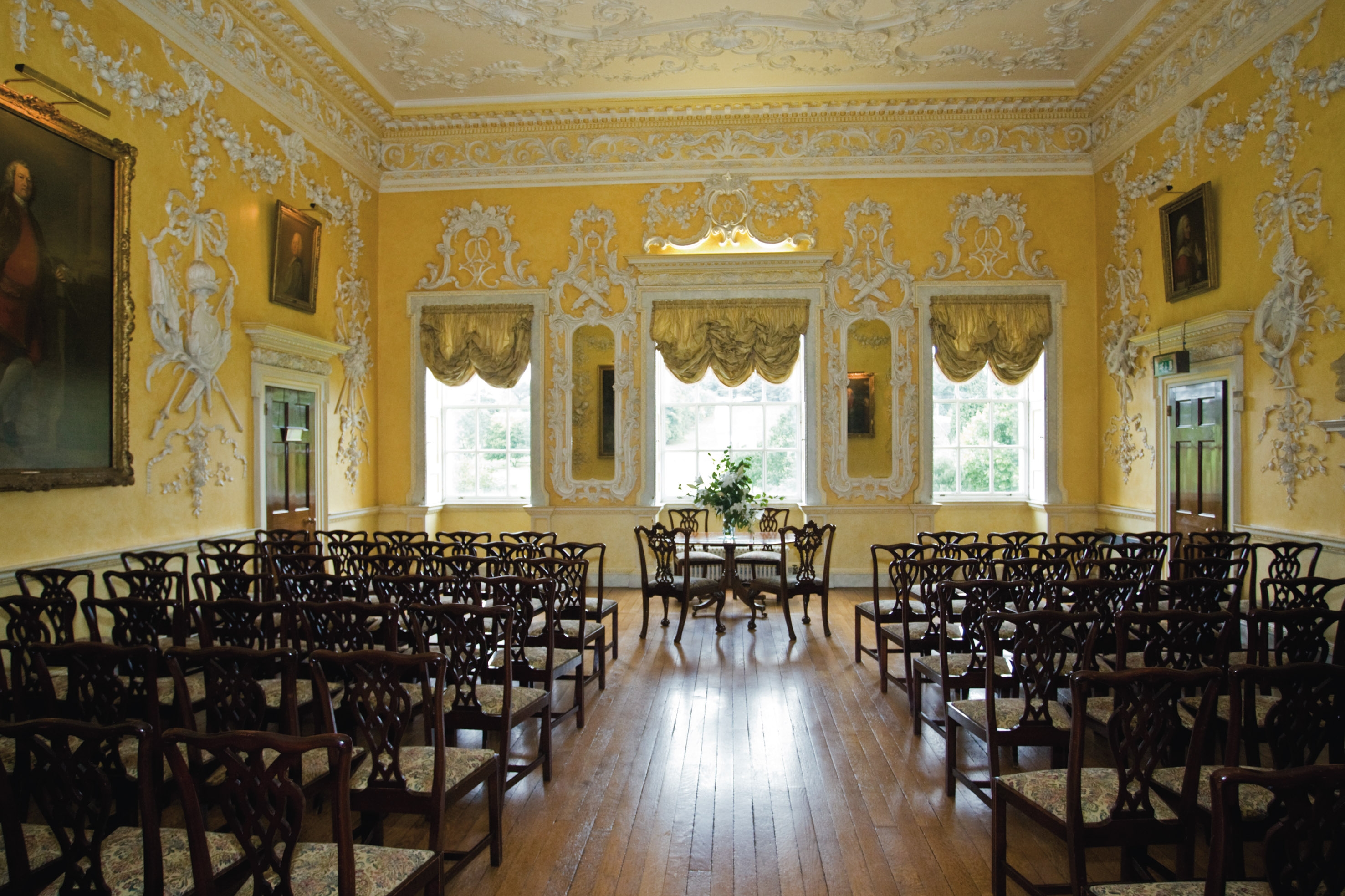 Elegant meeting space with ornate decor in The Saloon, Hagley Hall for events and gatherings.
