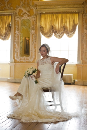Bride in elegant Saloon at Hagley Hall, perfect for weddings and upscale events.
