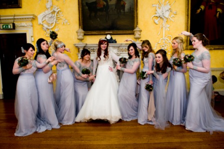 Bridal party in The Saloon, Hagley Hall with elegant decor for weddings and events.