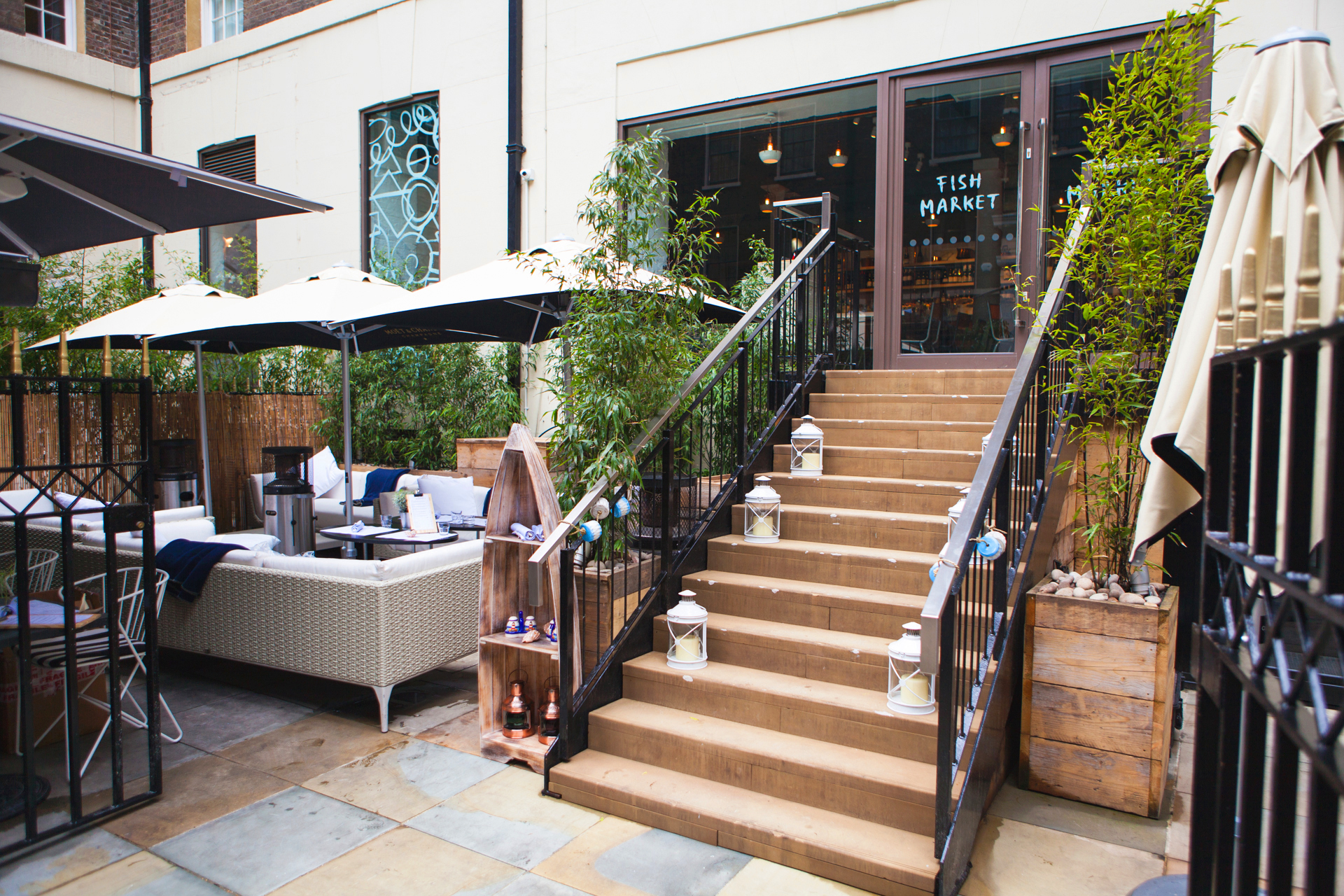 Charming outdoor venue with cozy seating for events at Fish Market Terrace.