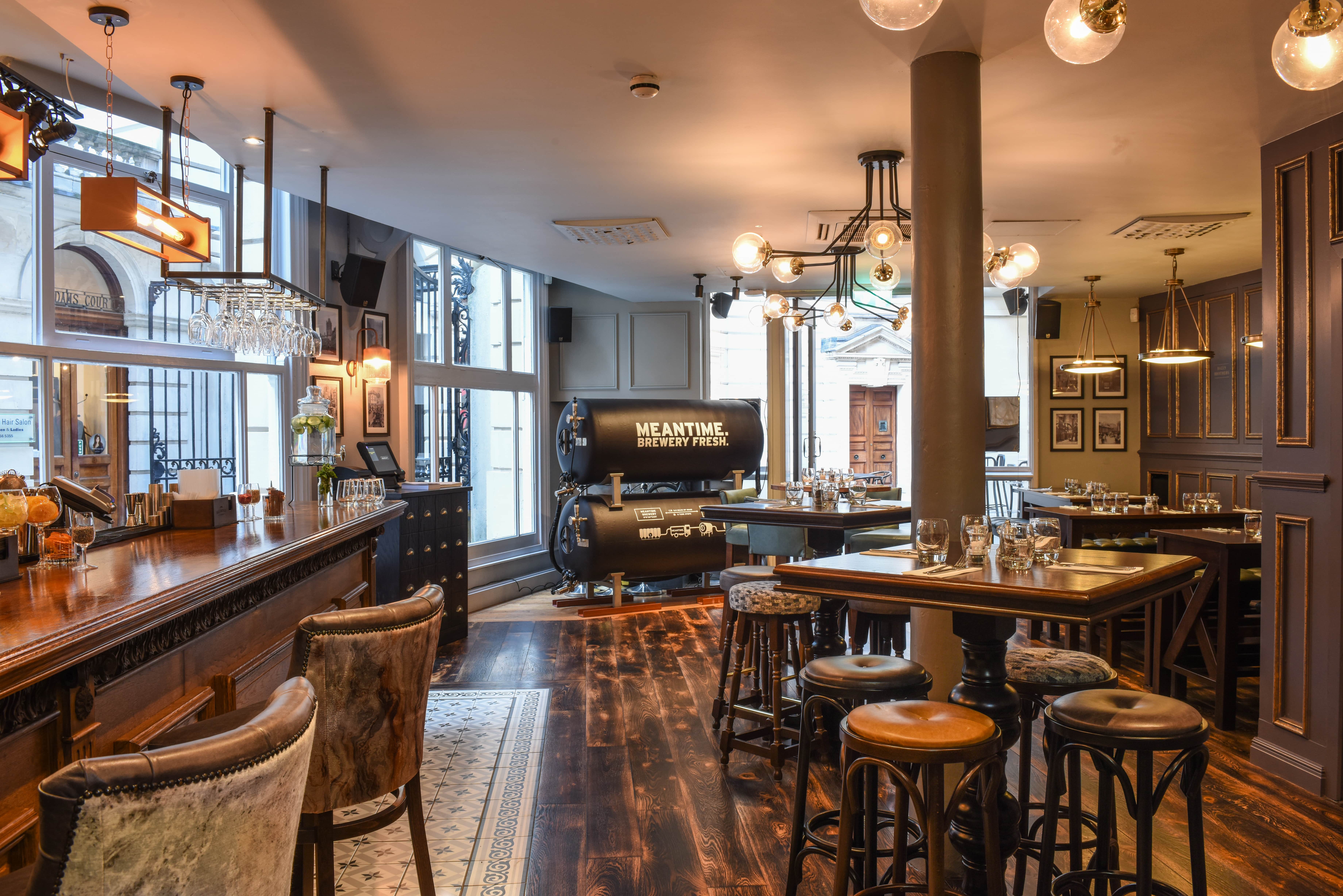 Stylish venue with warm lighting for intimate meetings and events in Jamie's Adams Court.