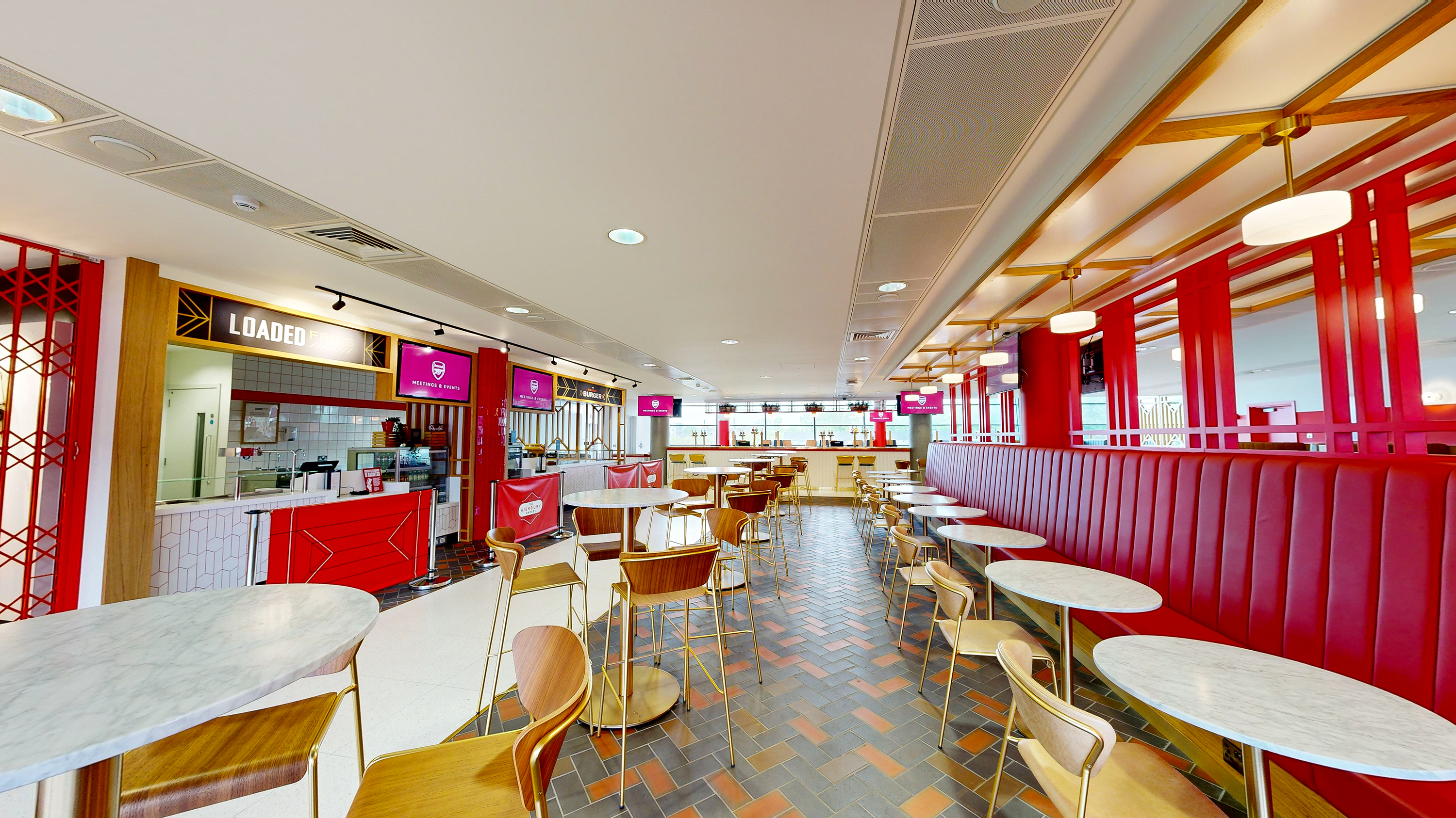 Modern dining space at Arsenal's Emirates Stadium, ideal for networking events and meetings.