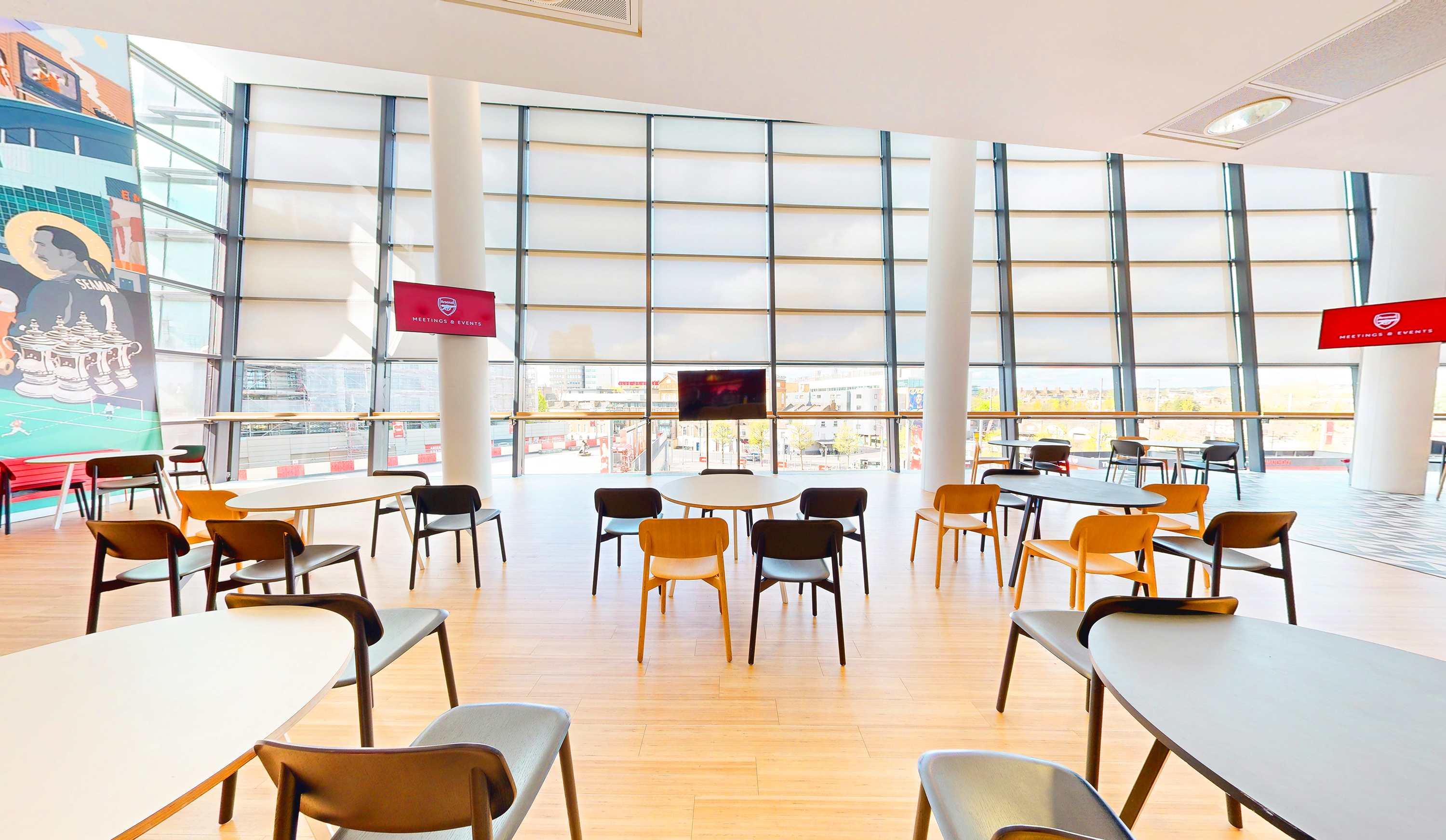 Arsenal Emirates Stadium event space with large windows for workshops and networking.