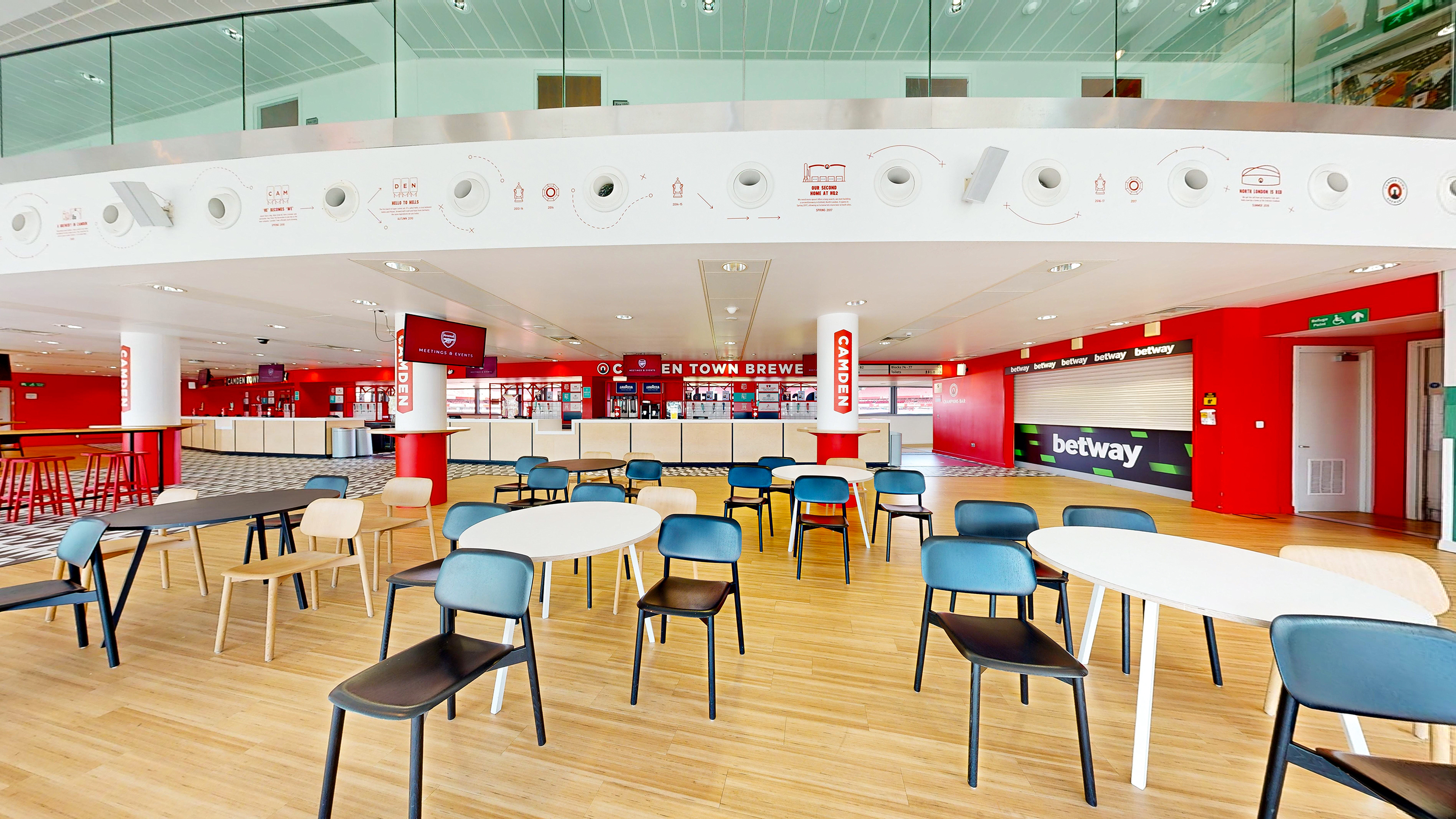 Champions event space at Arsenal FC, featuring flexible seating and vibrant decor.