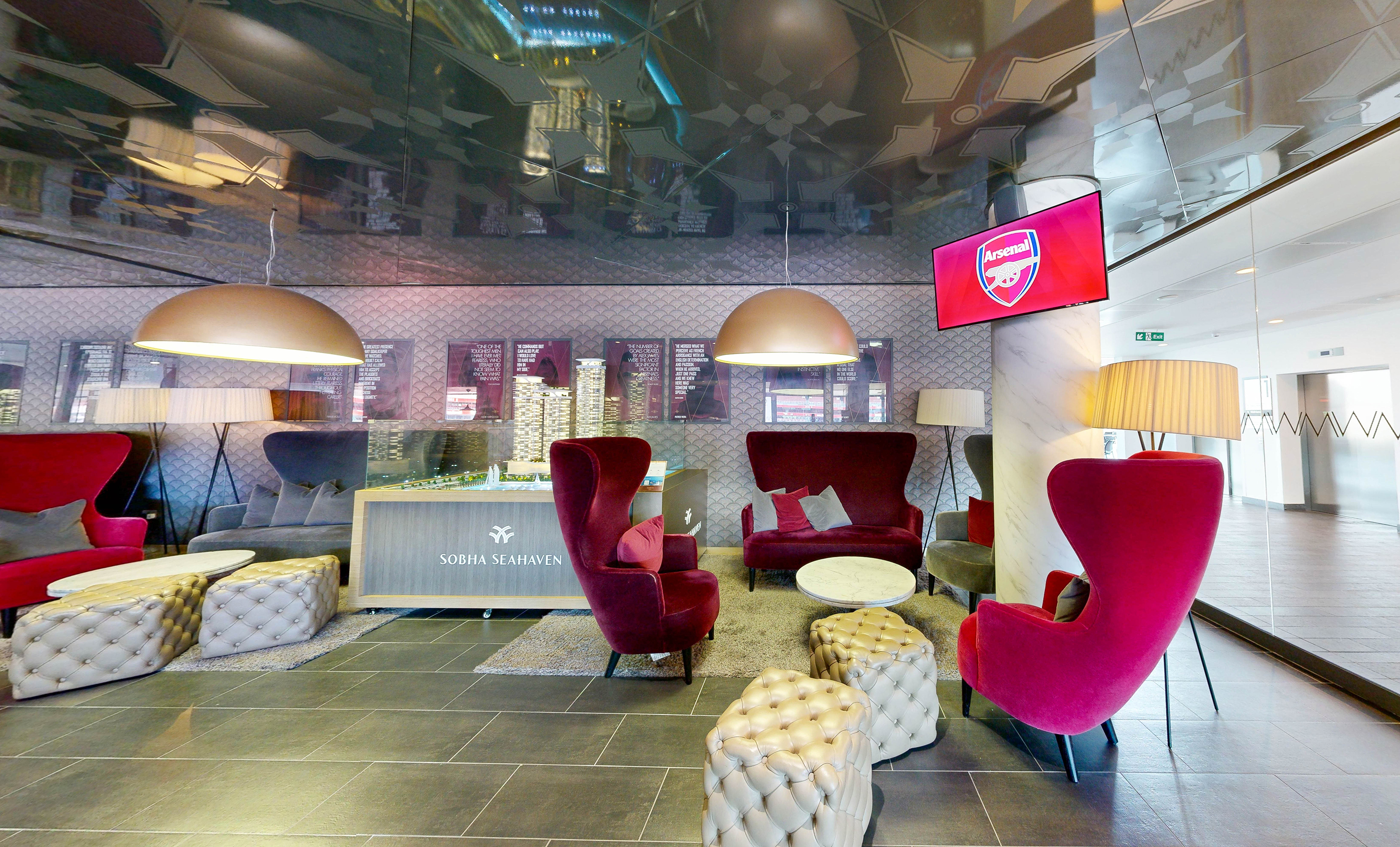 W Club lobby at Emirates Stadium, stylish seating for networking events and meetings.