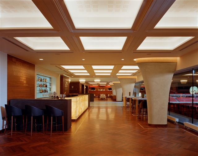 Diamond Club at Emirates Stadium: modern event space with sleek bar, ideal for receptions.