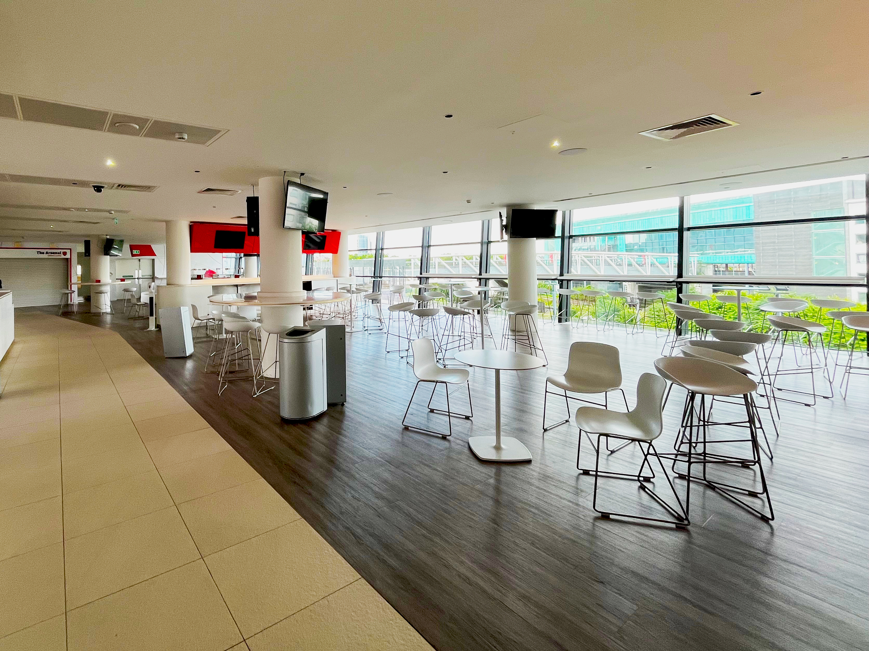 Legends event space at Arsenal FC, featuring sleek furniture for corporate gatherings.