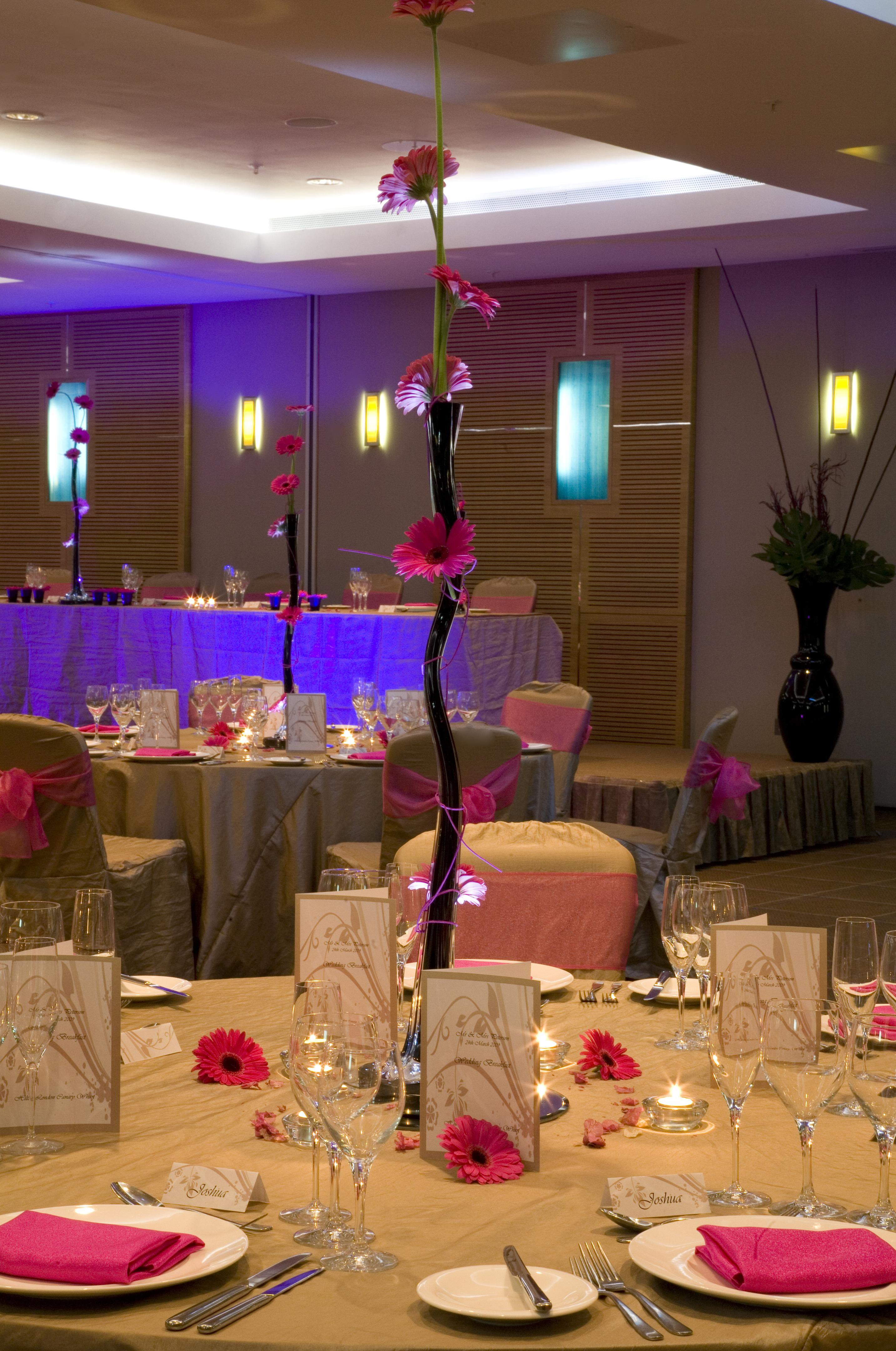 Quayside suite at Hilton London, elegant wedding event space with pink accents.