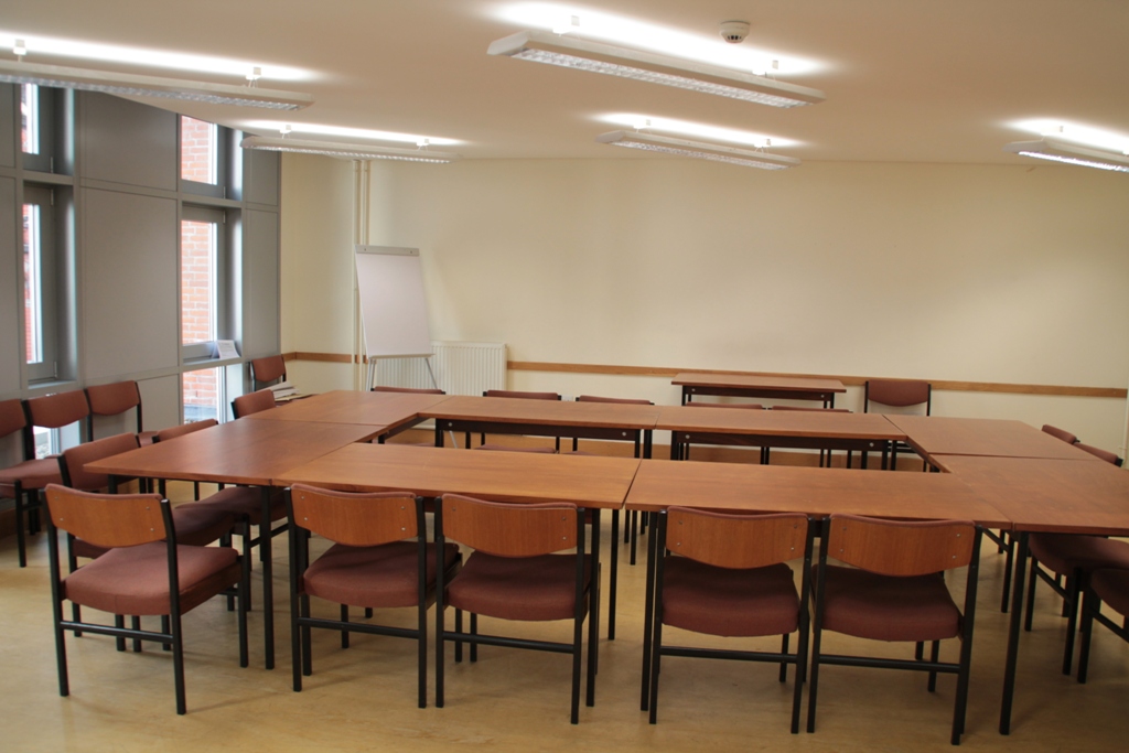 Lecture Room in Liverpool Quaker Meeting House with U-shaped tables for workshops.