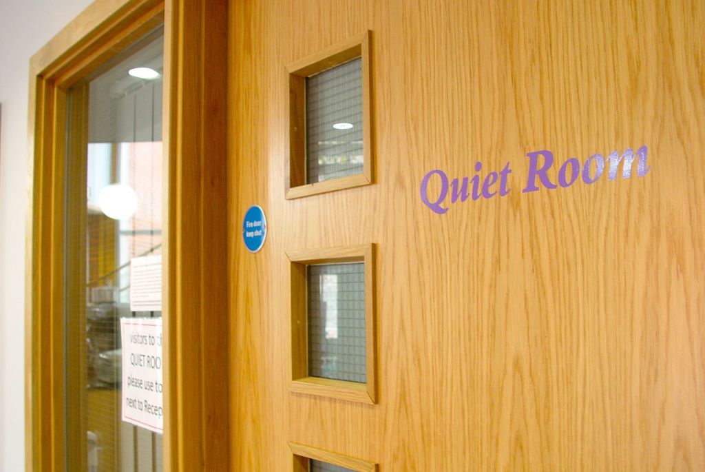 "Elizabeth Fry Room door at Liverpool Quaker Meeting House for event focus and relaxation."