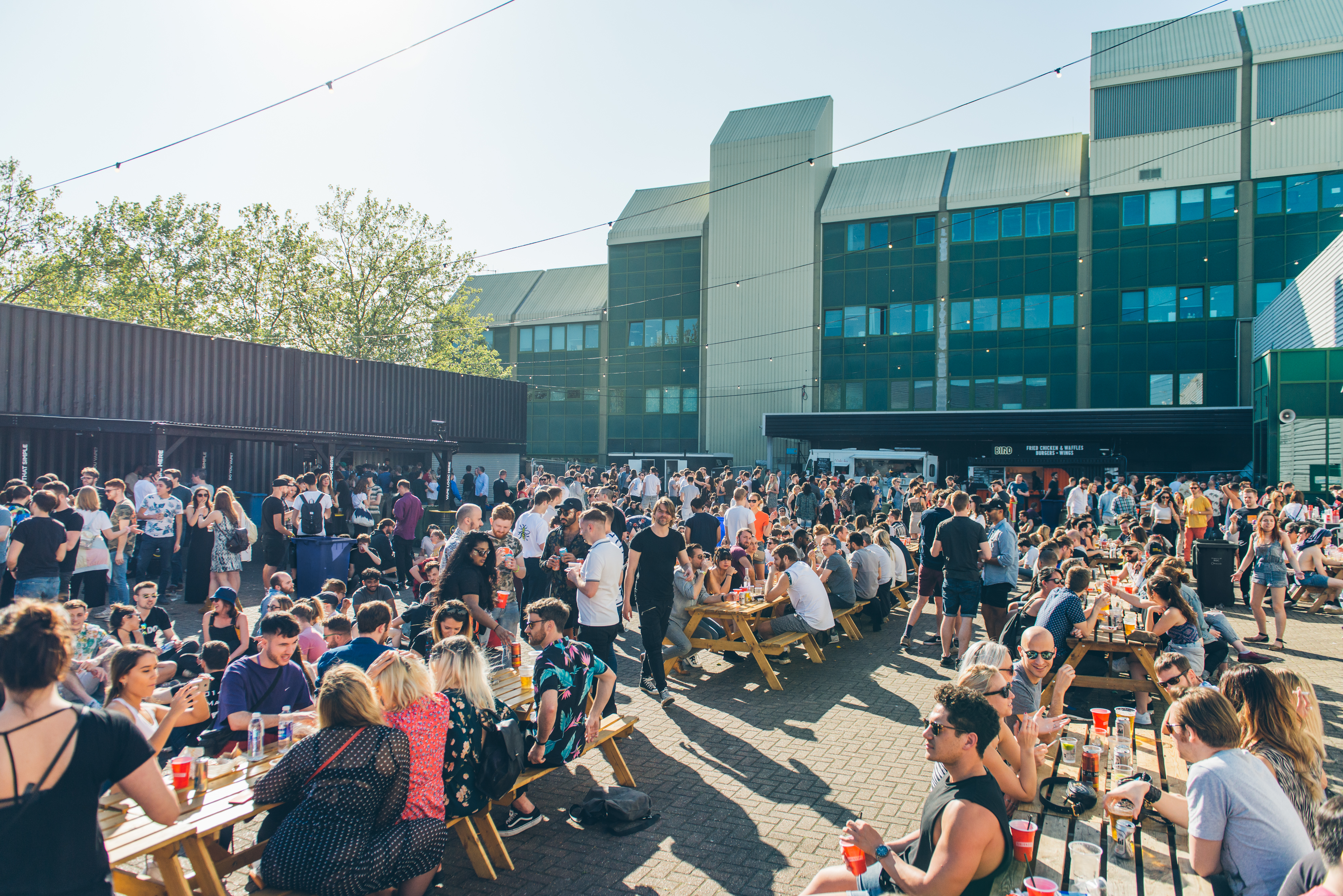 Vibrant outdoor event at Container Yard, Printworks London, perfect for networking and socializing.