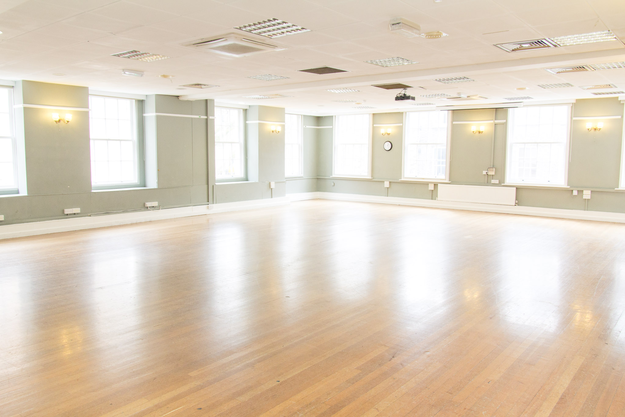 Presidential Suite at The London Irish Centre, spacious event room with natural light.