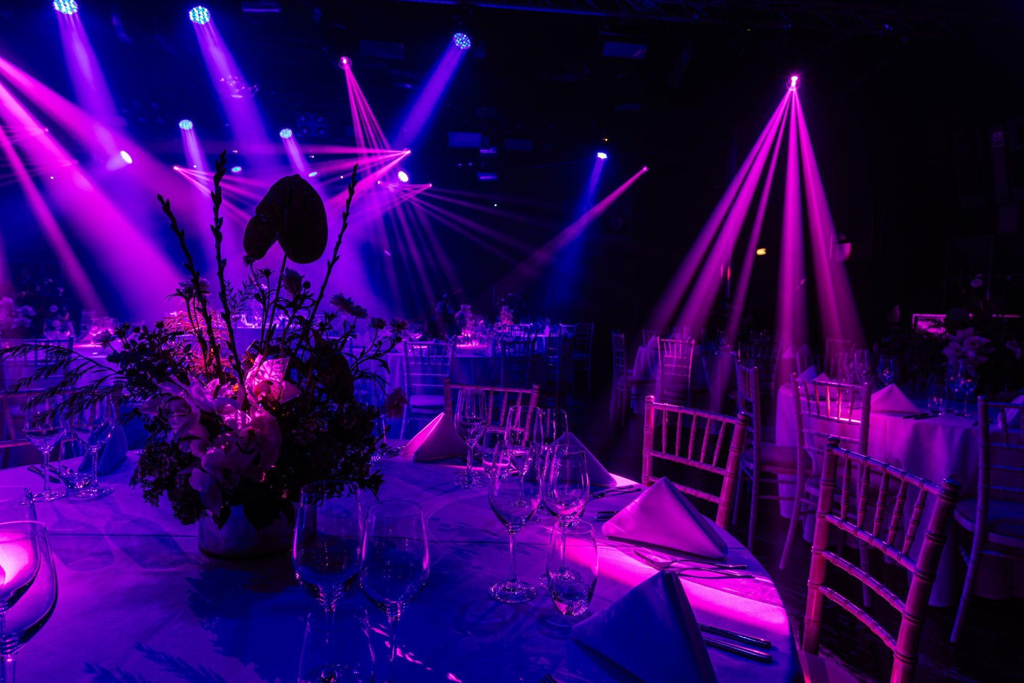 Elegant event space at The Box, Ministry of Sound, with vibrant purple lighting for galas.