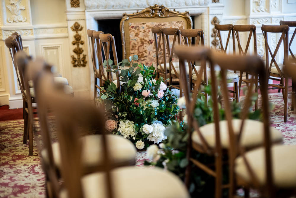 Elegant ceremony setup with floral centerpiece at Six Park Place for weddings.
